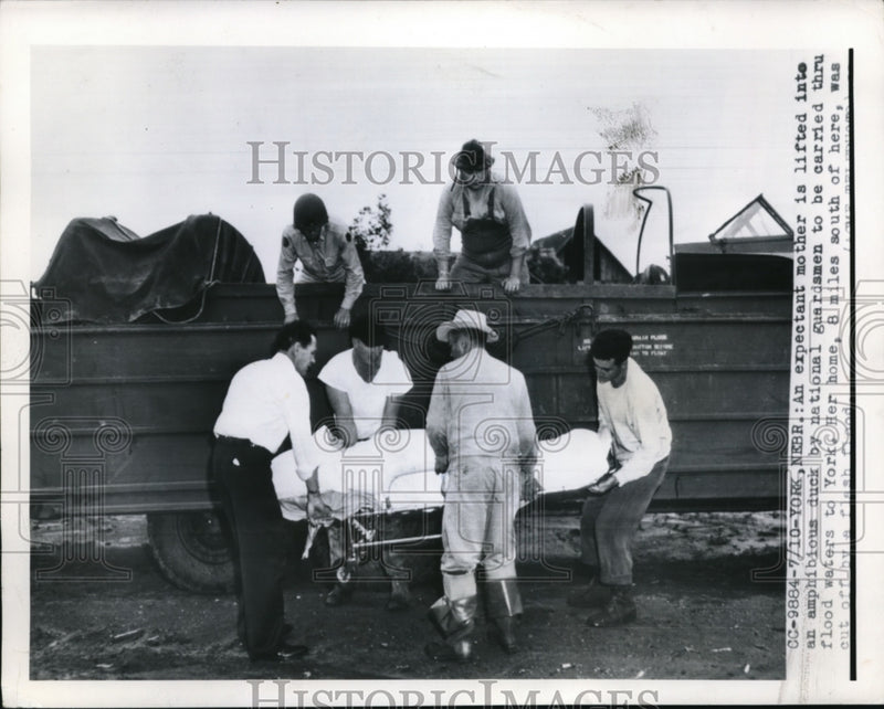 Load image into Gallery viewer, 1950 Press Photo An expectant mother lifted by national guardsmen during flood
