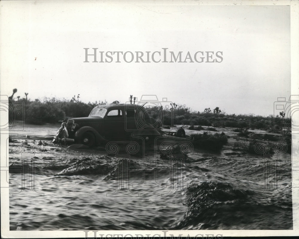 1938 Press Photo Flood Washed Out Abandoned Car, Lancaster California Desert