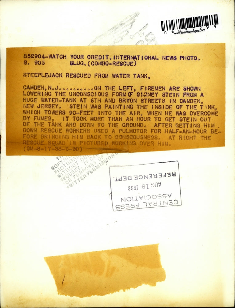 1938 Press Photo Firemen shown lowering unconscious Sidney Stein after accident