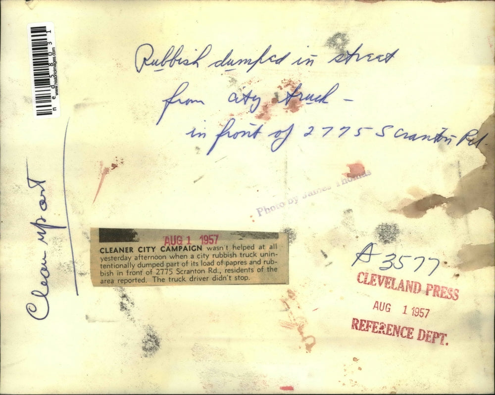 1957 Press Photo Rubbish dumped in street from city truck on 2775 Scranton, Rd.