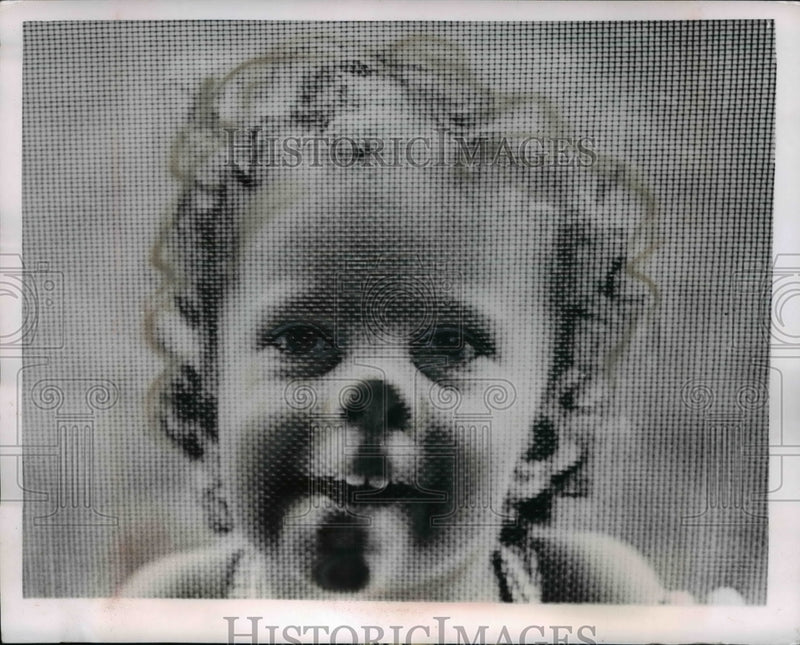 Load image into Gallery viewer, 1954 Press Photo Newburgh NY Karen Leigh Crosby flattens her face against
