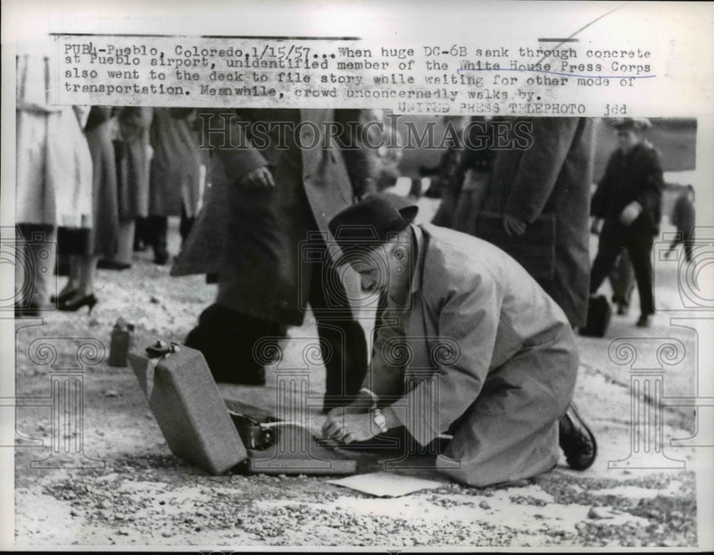 Load image into Gallery viewer, 1957 Press Photo Pueblo Colo when a huge DC-6B sank through concrete at Pueblo
