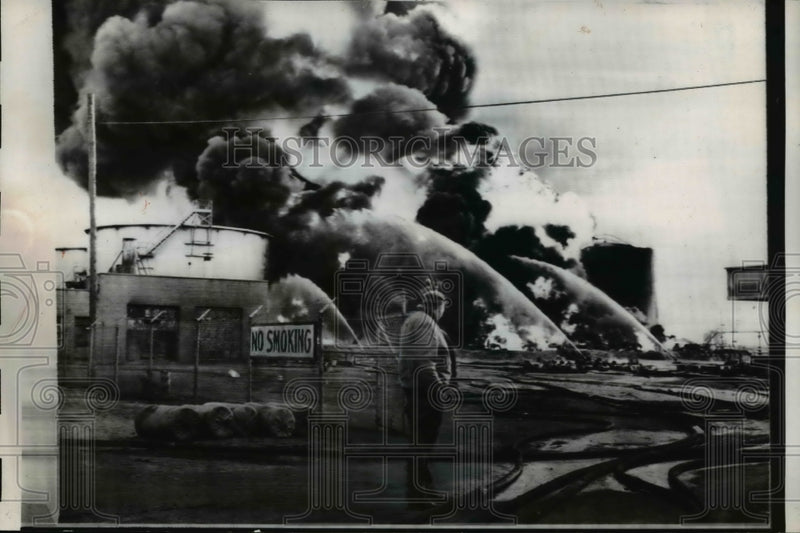 Load image into Gallery viewer, 1958 Press Photo The gasoline storage tanks on fire after an accident
