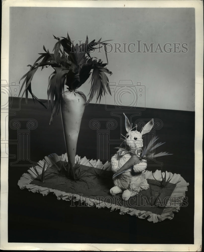 1940 Press PhotoEaster Bunny with huge carrot-look-like tree.
