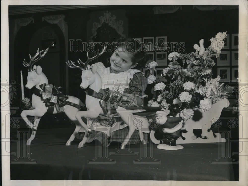 1949 Press Photo Jo Ann Clare with the Christmas decorations