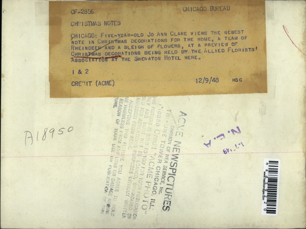 1949 Press Photo Jo Ann Clare with the Christmas decorations