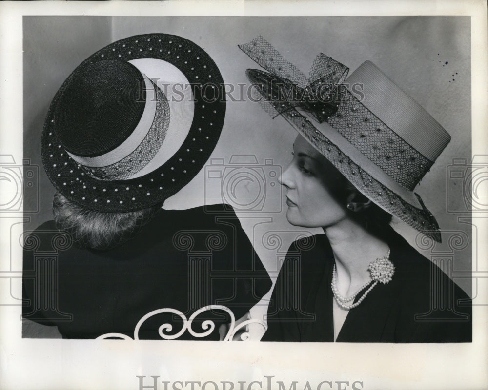 1947 Press Photo Women wearing embroidered hats- Historic Images