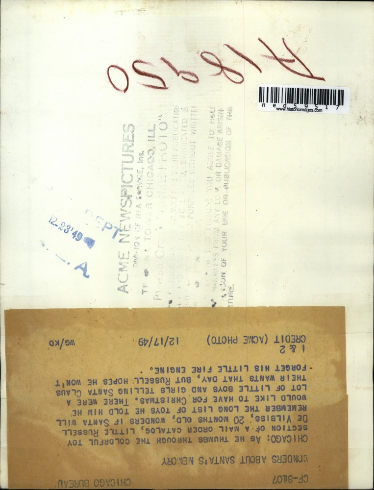 1949 Press Photo Little Russell De Vilbiss wanders what will Santa give him