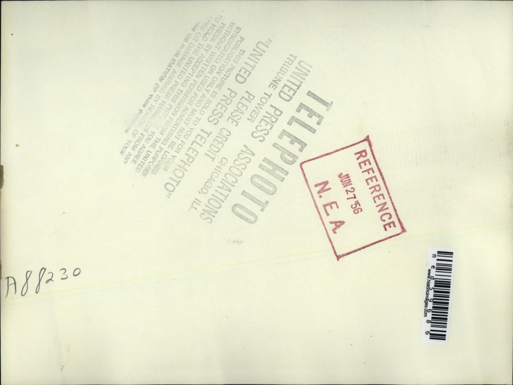 1956 Press Photo Anita Maslowski, Minn. Model relaxed by a fan blowing with ice