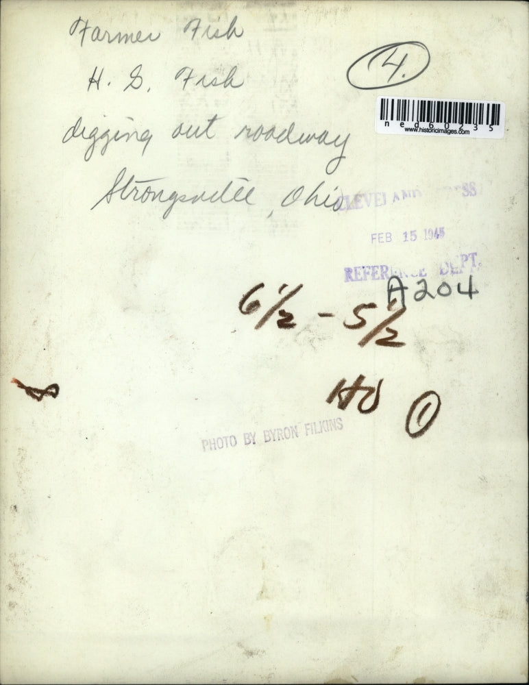 1945 Press Photo Farmer HS Fish digs snow from road in Strongville Ohio