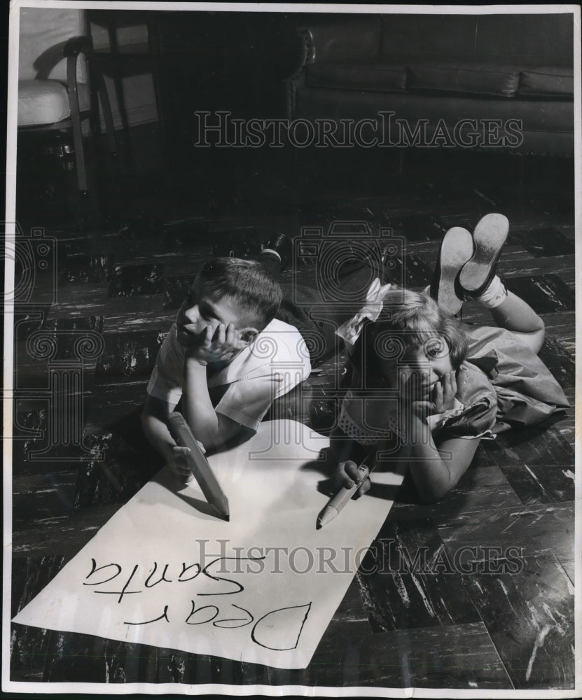 1952 Press Photo Two Moose Child Youngsters Writing a Dear Santa Letter