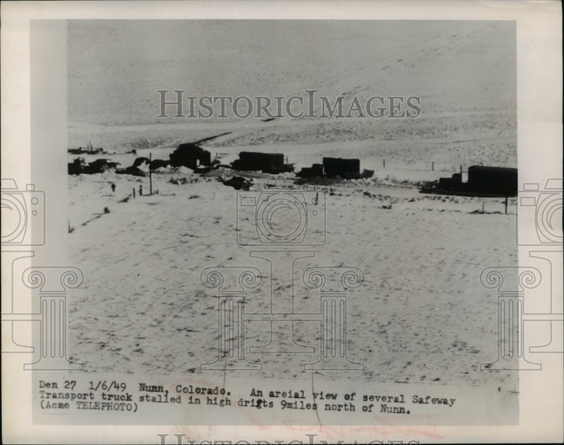Load image into Gallery viewer, 1949 Press Photo The aerial view of the vehicles stalled in high drifts in Nunn
