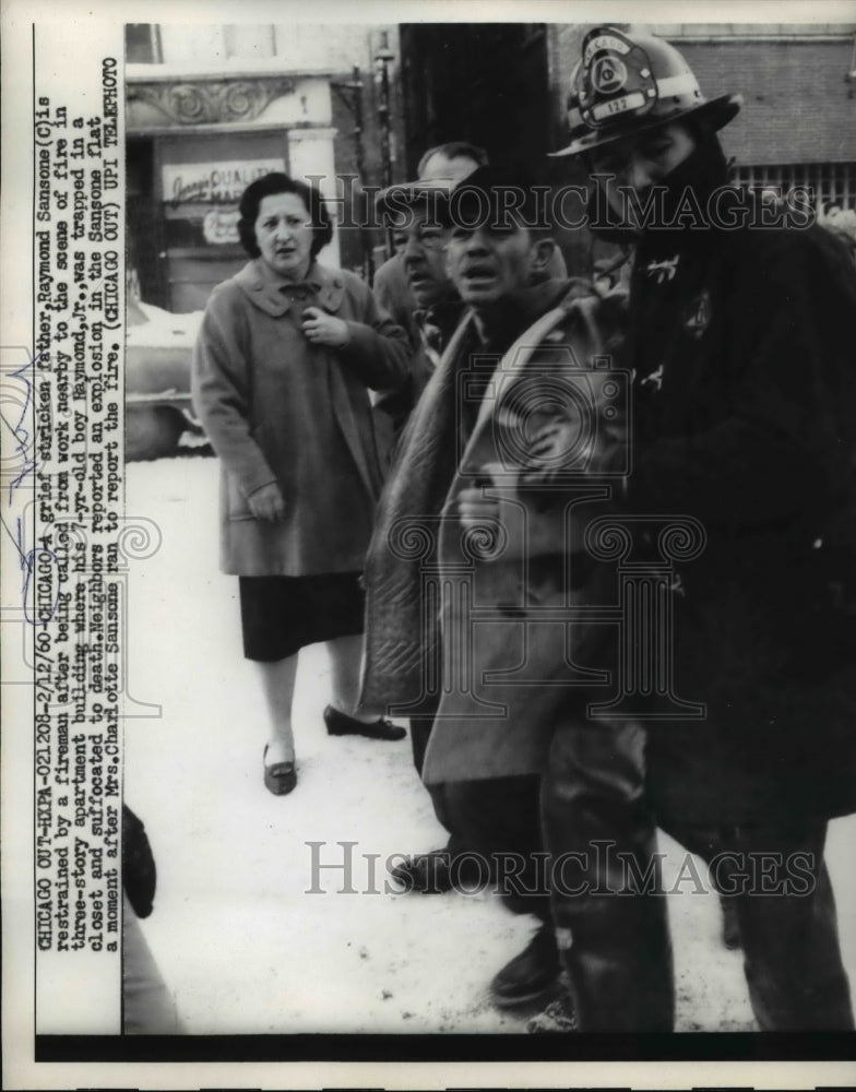 1960 Press Photo Grief stricken father, Raymond Sansone, restrained by firemen