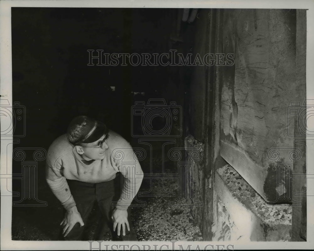 1941 Press Photo Andrew Broucker checks the furnace in heat test