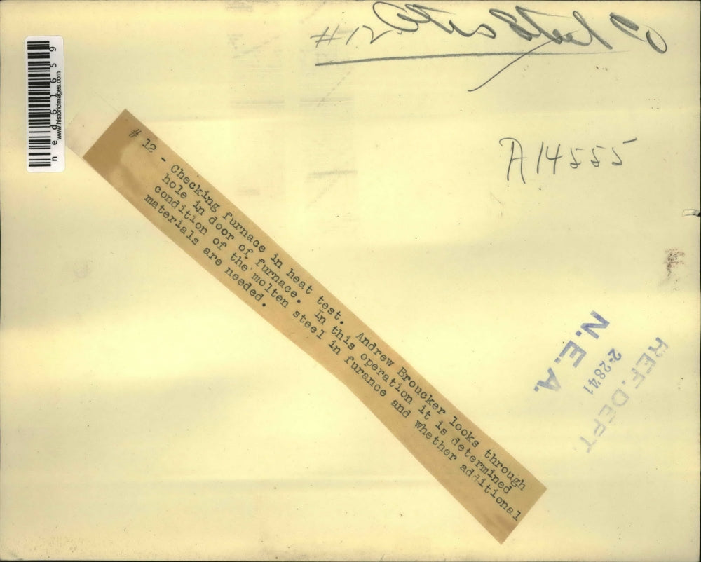 1941 Press Photo Andrew Broucker checks the furnace in heat test