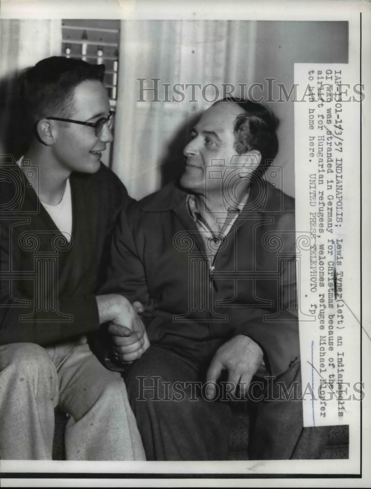 Load image into Gallery viewer, 1957 Press Photo Indianapolis GI, Lewis Tyner with refugee Michael Klopfer
