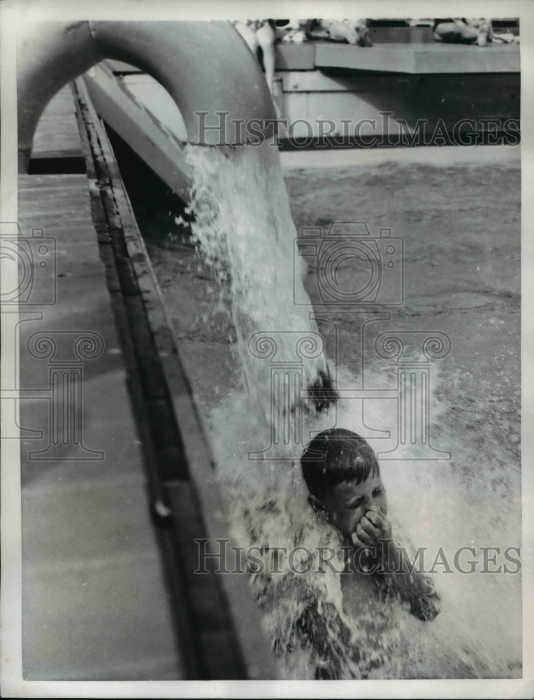 1955 Press Photo The kid enjoys the water spout