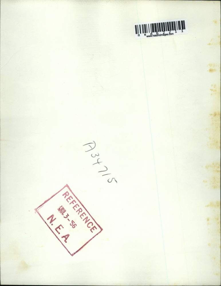 1956 Press Photo Rescue Workers give oxygen to Charles Dickinson, 50