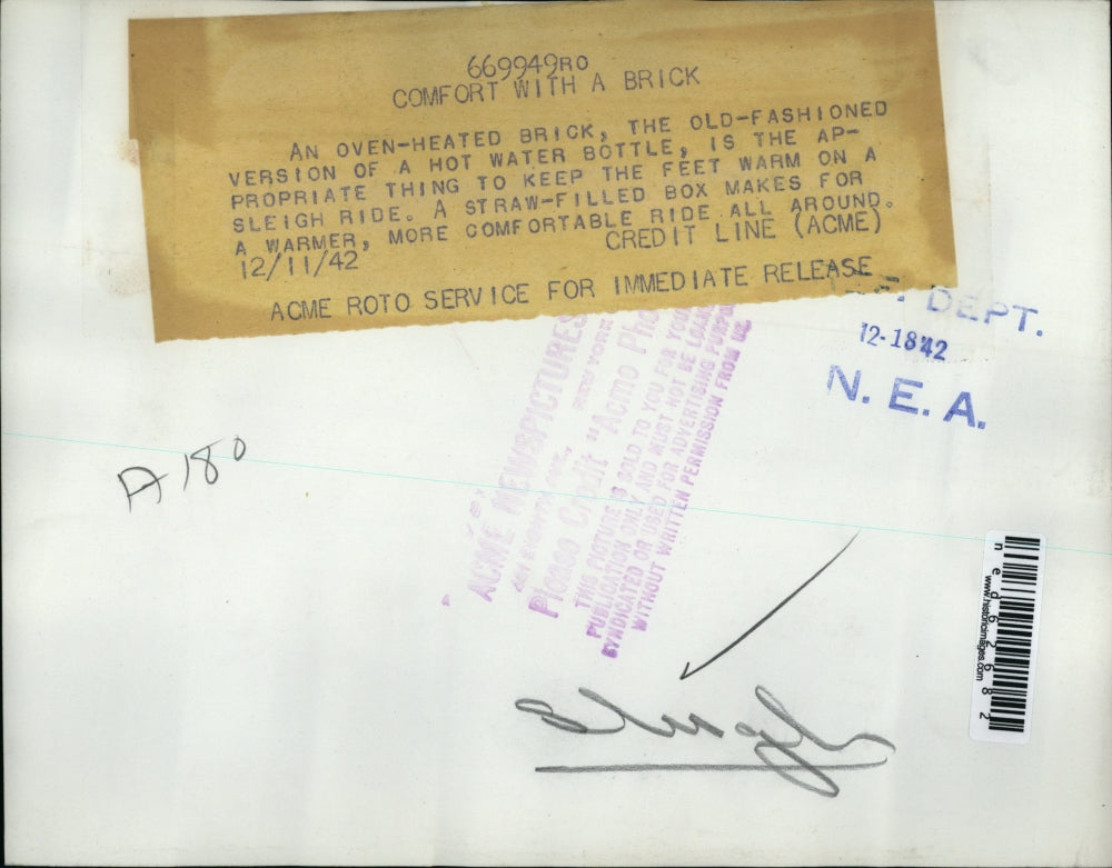 1942 Press Photo Oven Heated Brick for Sleight Ride with Straw Filled Box