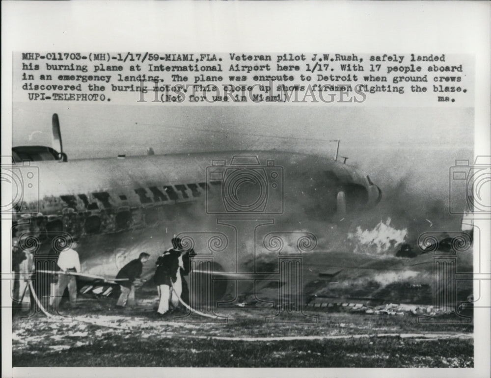 1959 Press Photo Pilot J.W. Rush Lands Burning Plane at International Airport