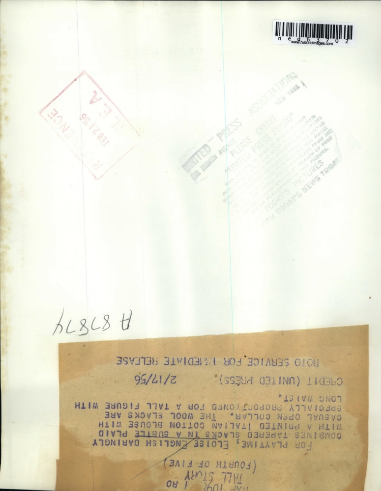 1956 Press Photo Eloise English models tapered blacks in subtle plaid