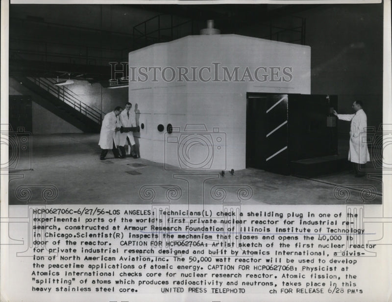 Load image into Gallery viewer, 1956 Press Photo Los Angeles technicians check a shielding plug in one of the
