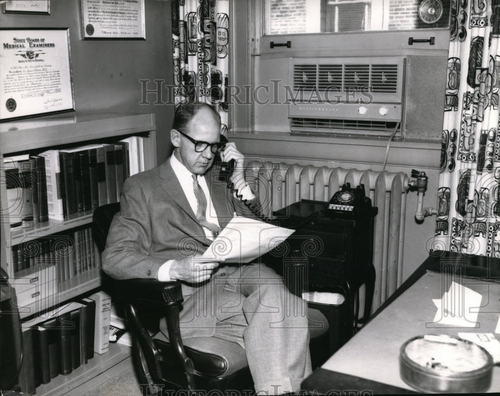 1961 Press Photo Dr. Joseph P. Steele on the Phone