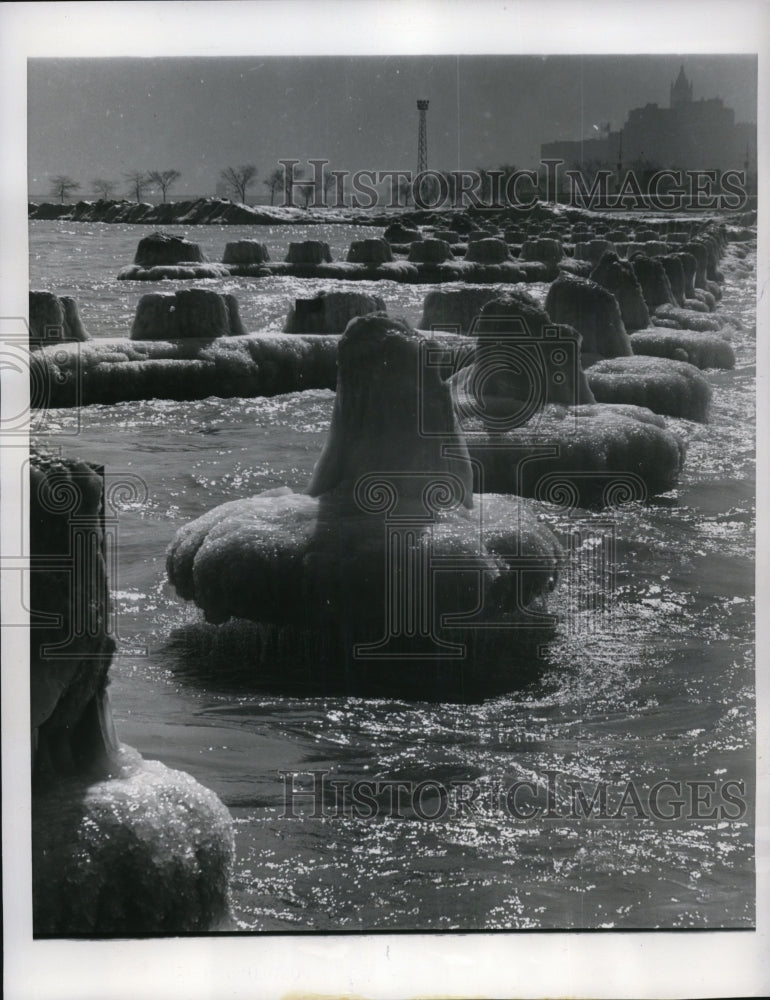 Load image into Gallery viewer, 1960 Press Photo Inverted Mushroom shaped pilings alogn Chicago lakefront
