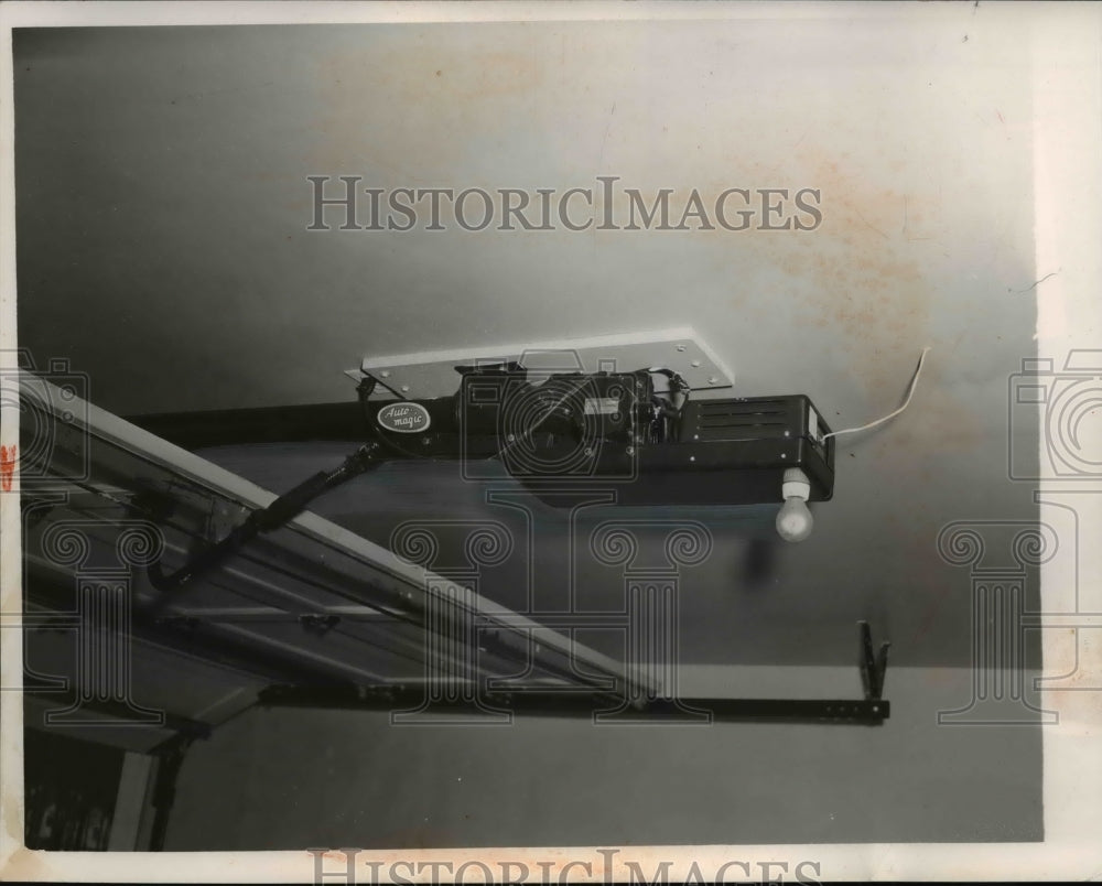 1954 Press Photo Radio unit in HOme of Safety Garage ceiling makes Raynor Garage