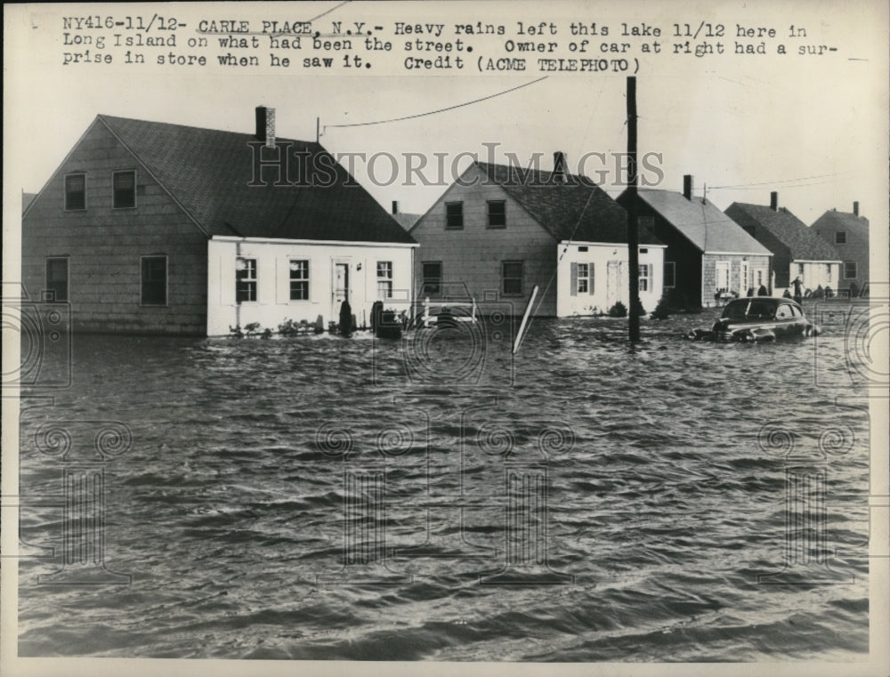 1947 Press Photo Carle Place New York Heavy Rain Flooded Lake Long Island- Historic Images