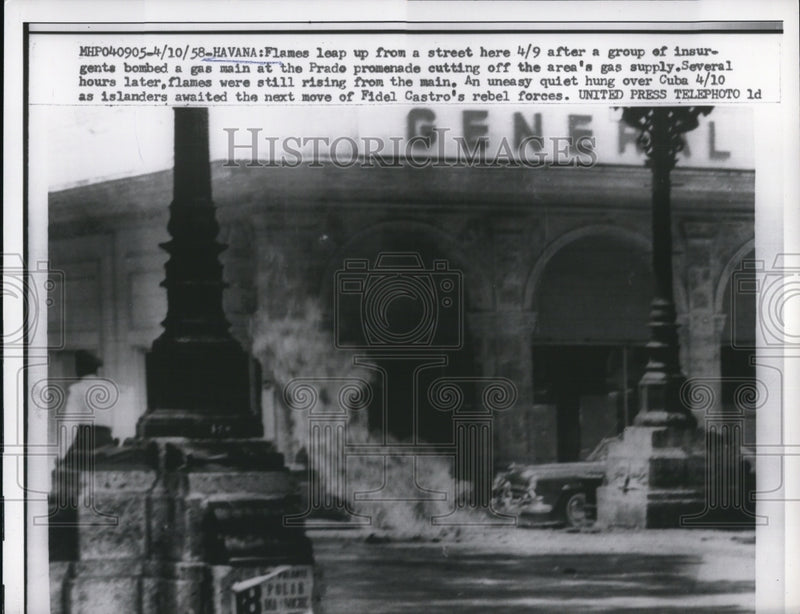 Load image into Gallery viewer, 1958 Press Photo Fire Rages After Insurgents Bombed Gas Main At Prado Promenade
