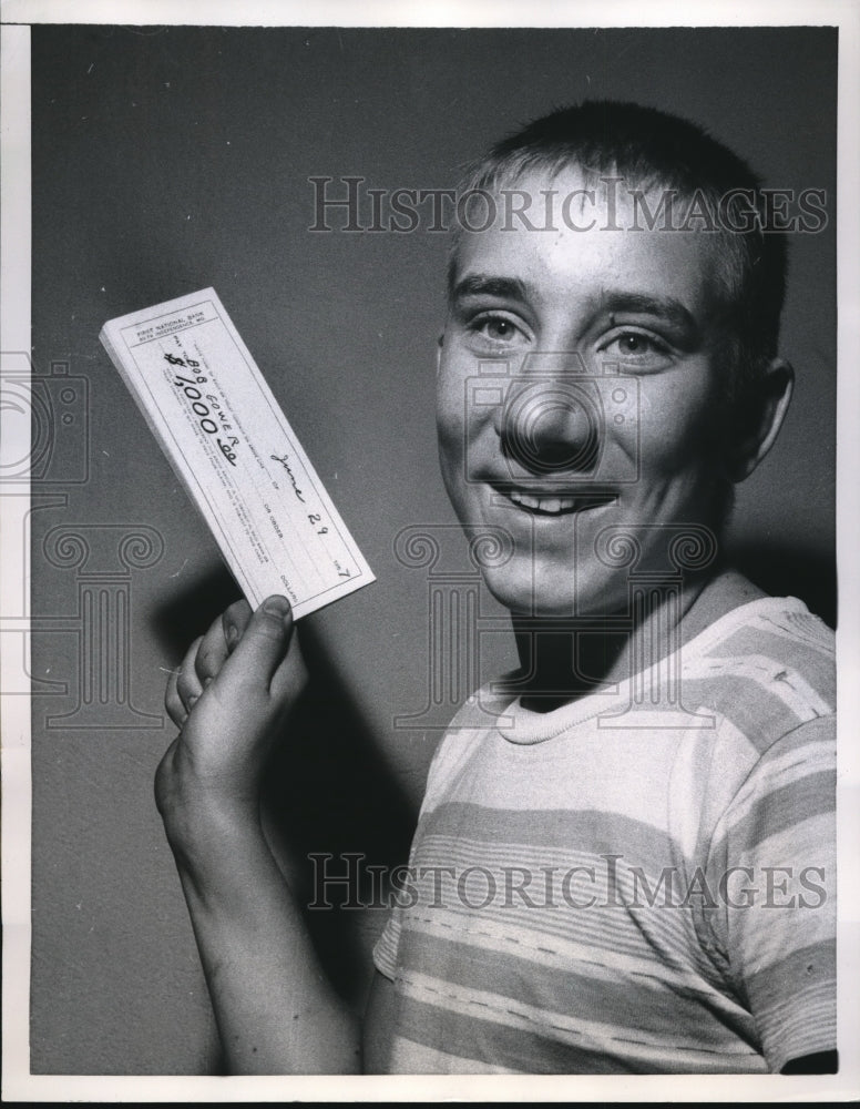 1957 Press Photo Bobby Crower Presenting his Check of Hardship- Historic Images