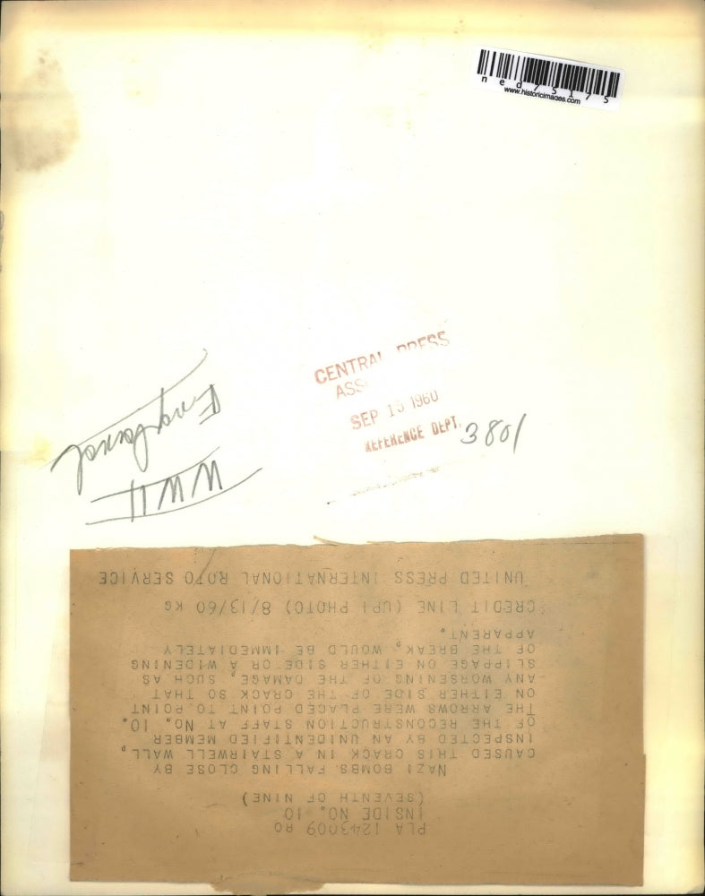 1960 Press Photo Reconstruction Staff Member Examines Wall Damage From Nazi Bomb