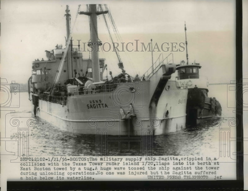 Load image into Gallery viewer, 1956 Press Photo Military supply ship Sagitta gets a tow with a tugboat.
