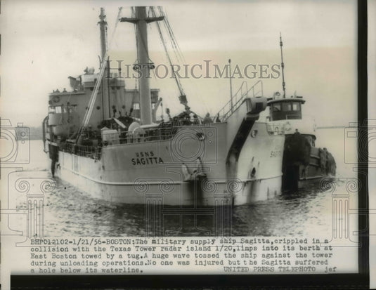 1956 Press Photo Military supply ship Sagitta gets a tow with a tugboat.