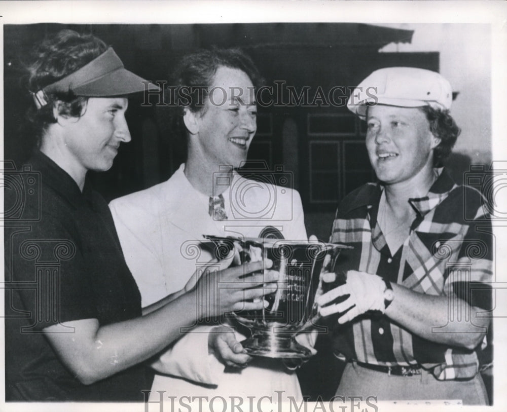 1951 Press Photo Holding Golf Cup- Historic Images