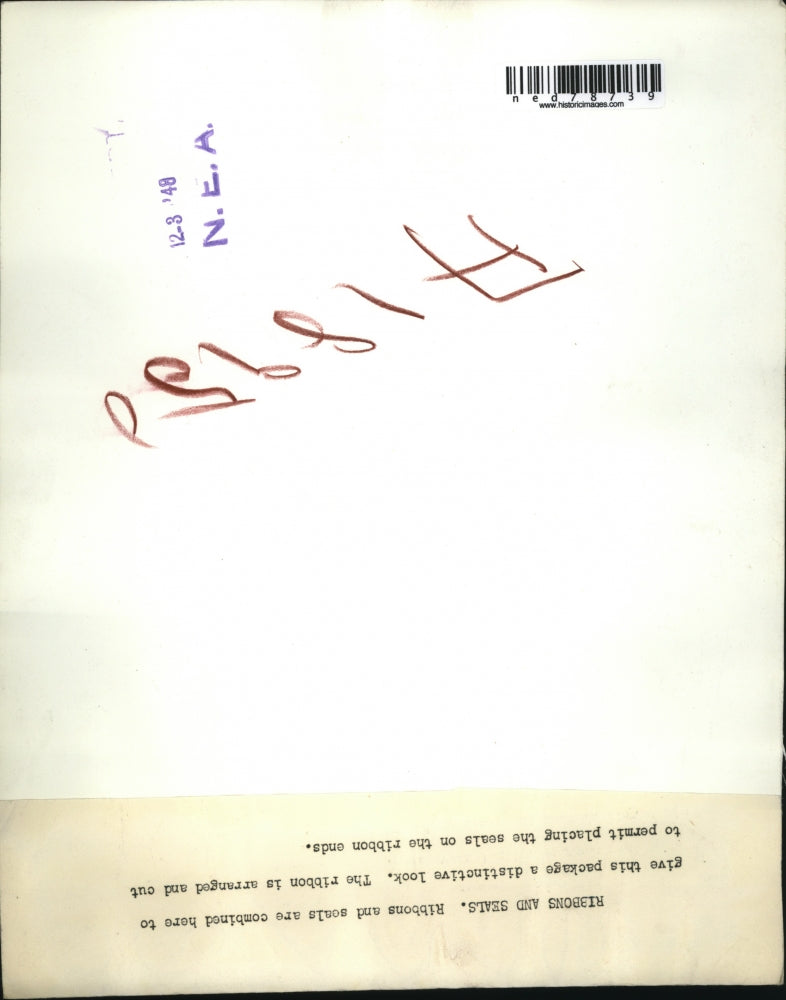 1948 Press Photo Combined Ribbon and Seals to give a package a distinctive look