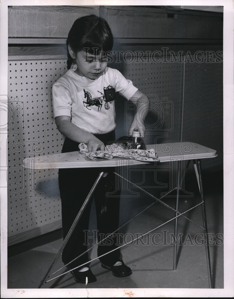 Load image into Gallery viewer, 1957 Press Photo Sherrie Elaine Lubert practicing how to be responsible
