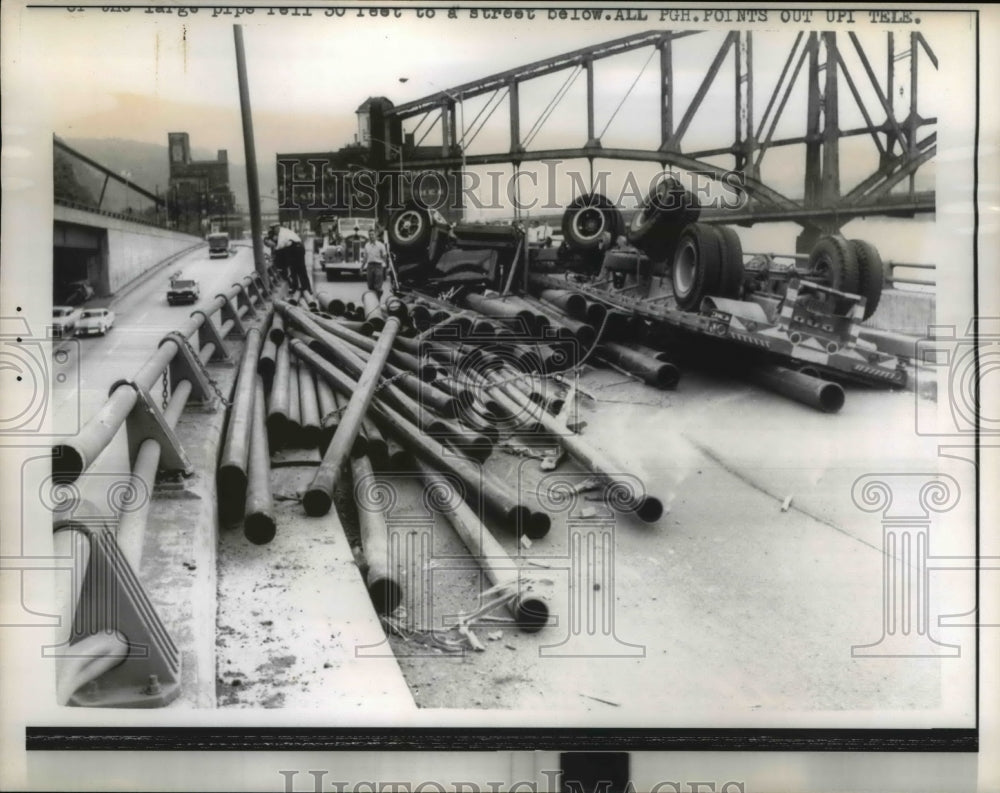 1962 Press Photo Pittsburgh the driver of this truck loaded with pipe escaped
