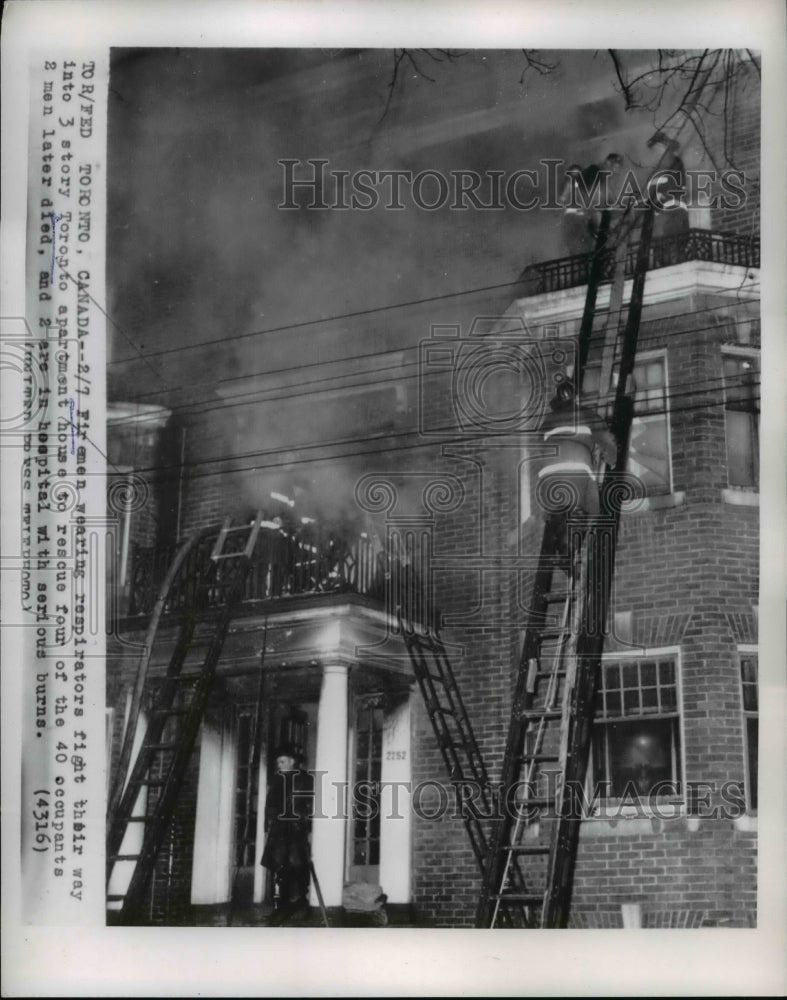 1956 Press Photo Toronto Canada firemen battle apartment house fire - ned81131