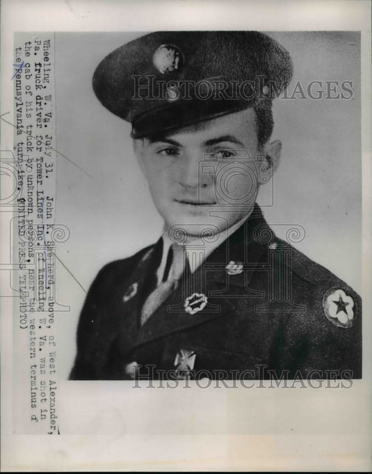 1953 Press Photo John K.Shepherd Truck Driver for Tower Lines Inc. shot in cab.