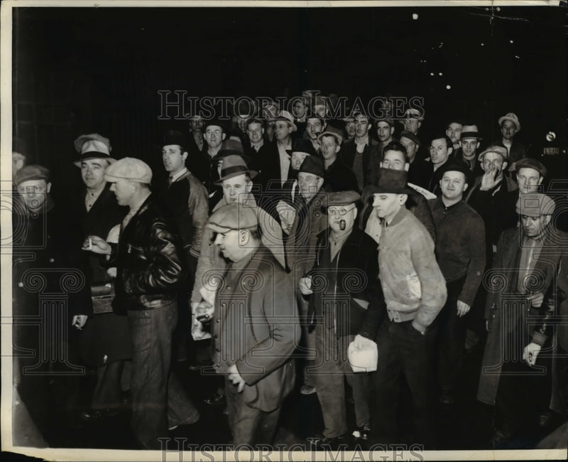 Load image into Gallery viewer, 1939 Press Photo Dodge employees going back to work after a month long strike
