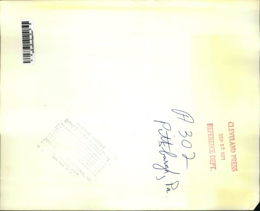 1971 Press Photo An employee of the Pittsburgh Press holds up a news paper