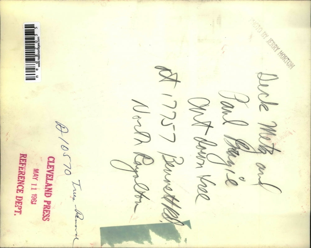 1961 Press Photo Deck Metz and Paul Bragie under the broken tree