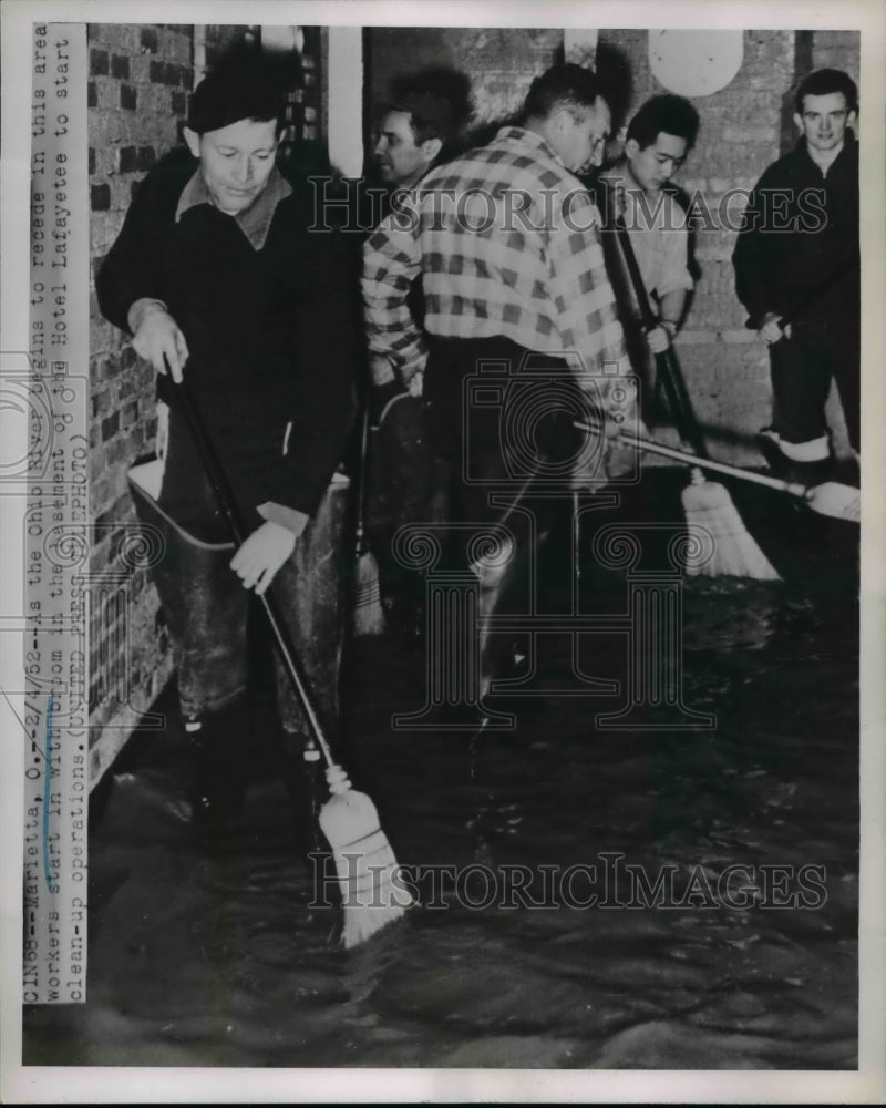 1952 Press Photo Start to Clean-up