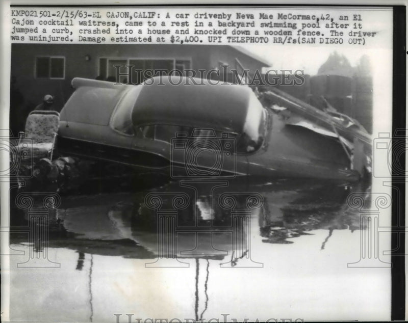 Load image into Gallery viewer, 1963 Press Photo El Cajon a car drven by Neva Mae McCormac came to rest in a
