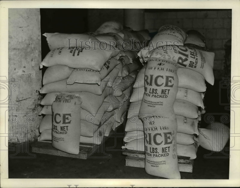 Load image into Gallery viewer, 1938 Press Photo The sacks of rice for the relief distribution
