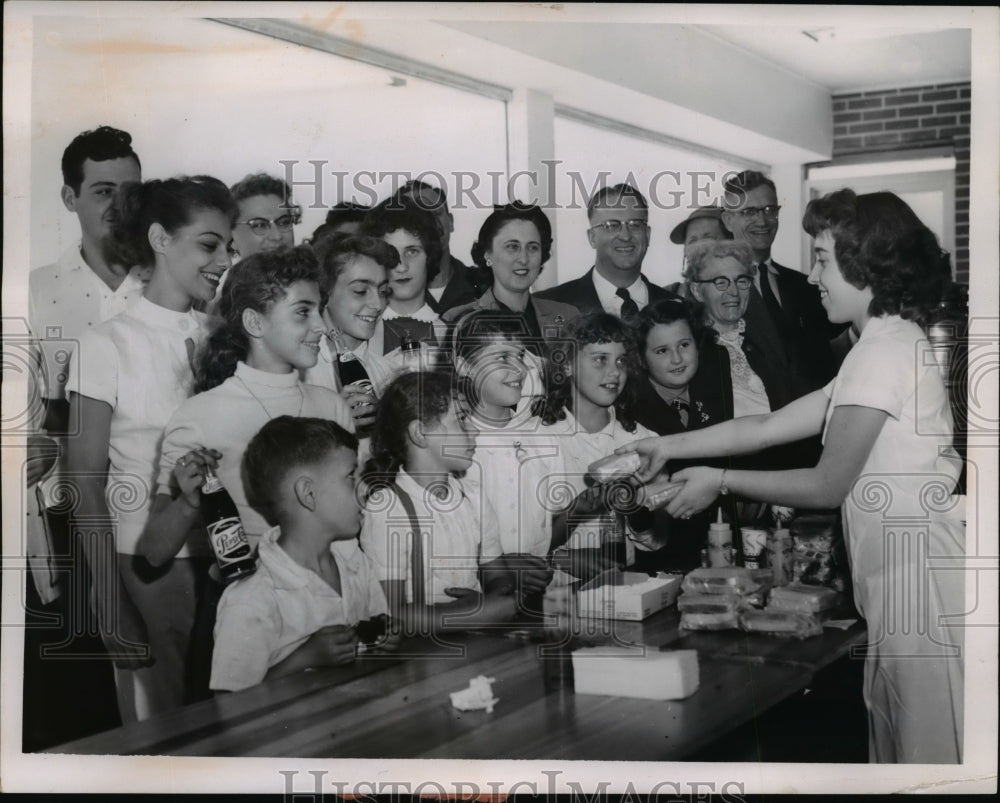 1955 Press Photo Counter girl Jerry Peak In foreground Mrs John Crotty and