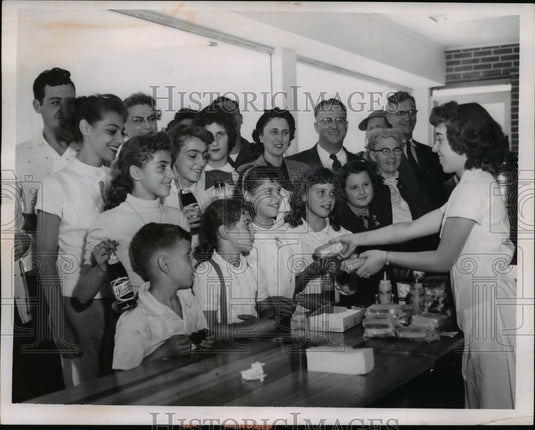 1955 Press Photo Counter girl Jerry Peak In foreground Mrs John Crotty and