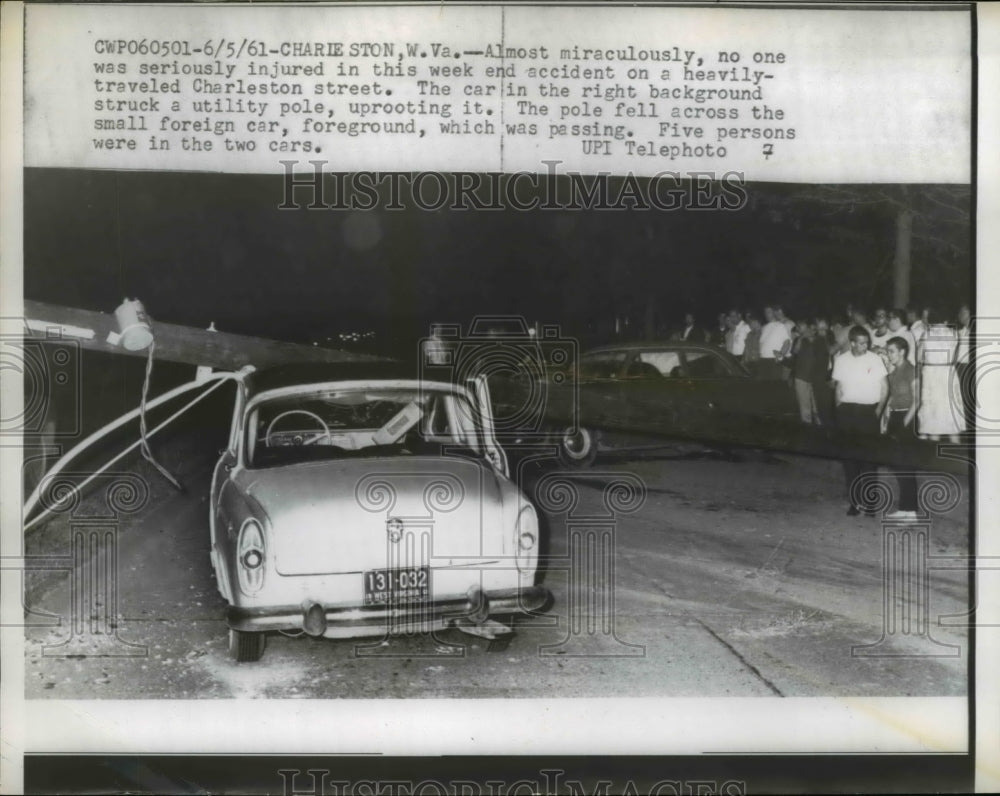 1961 Press Photo Car Crushed by Fallen Utility Pole, Charleston West Virginia
